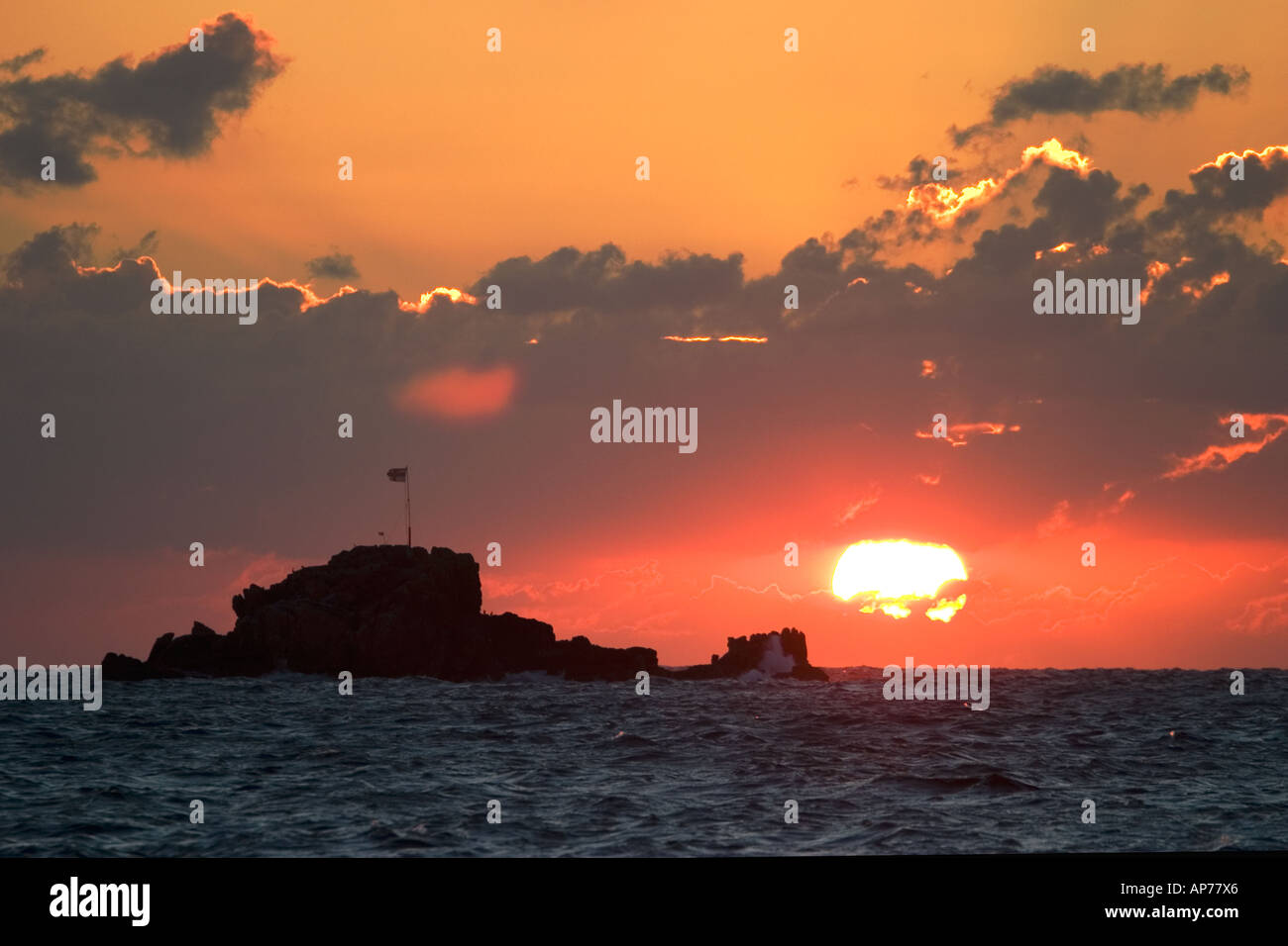 Tramonto della baia di Cobo Foto Stock