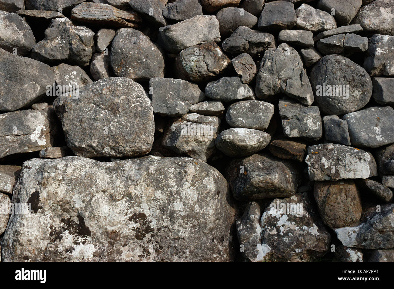 Primo piano di parete di pietra di Drystone Inghilterra Regno Unito GB Gran Bretagna Foto Stock