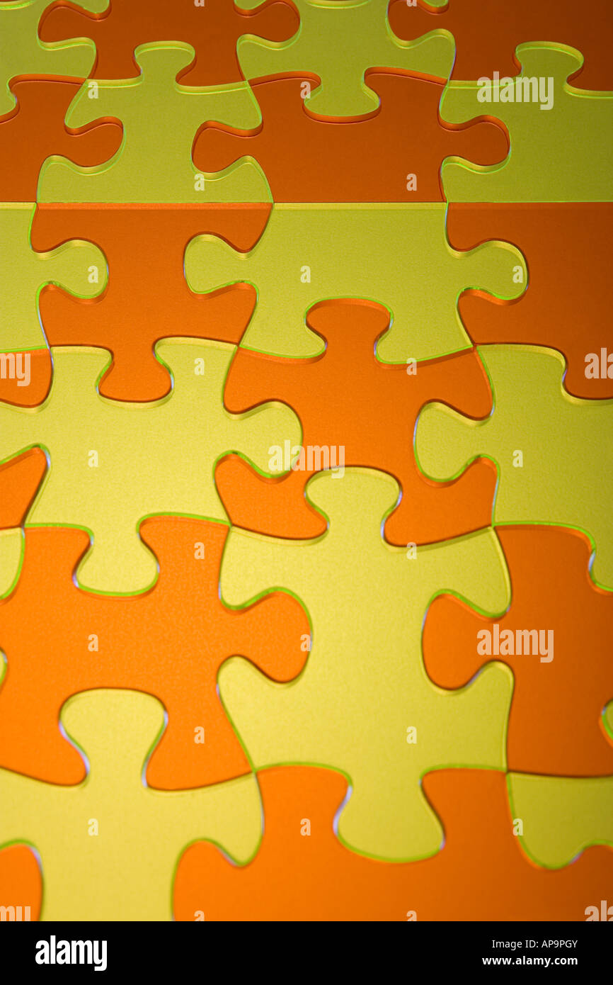 Arancione e giallo pezzi di puzzle Foto Stock