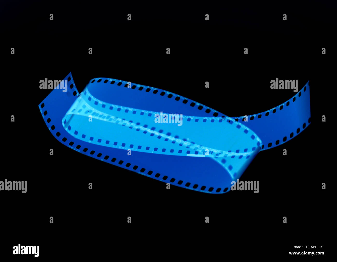 Rotolo pellicola negativa Curl Foto Stock