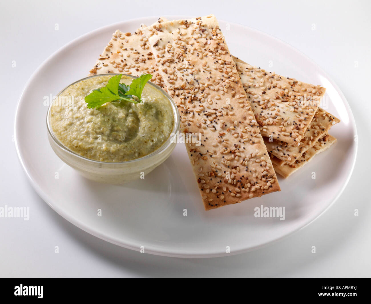 Hummus crackers dieta sana pranzo cibo editoriale Foto Stock