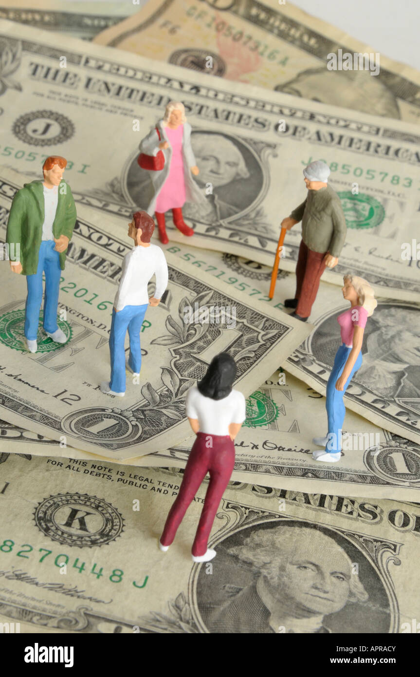 Il denaro / concetto finanziario - dollari e famiglia Foto Stock
