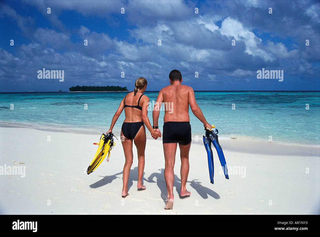 Coupel sulla Spiaggia, Snorkeling, Hotel spa Banyan Tree Vabbinfaru, Maledive Isola Foto Stock