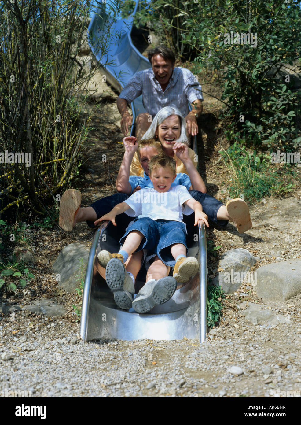 Famiglia piace andare su una diapositiva. Foto Stock