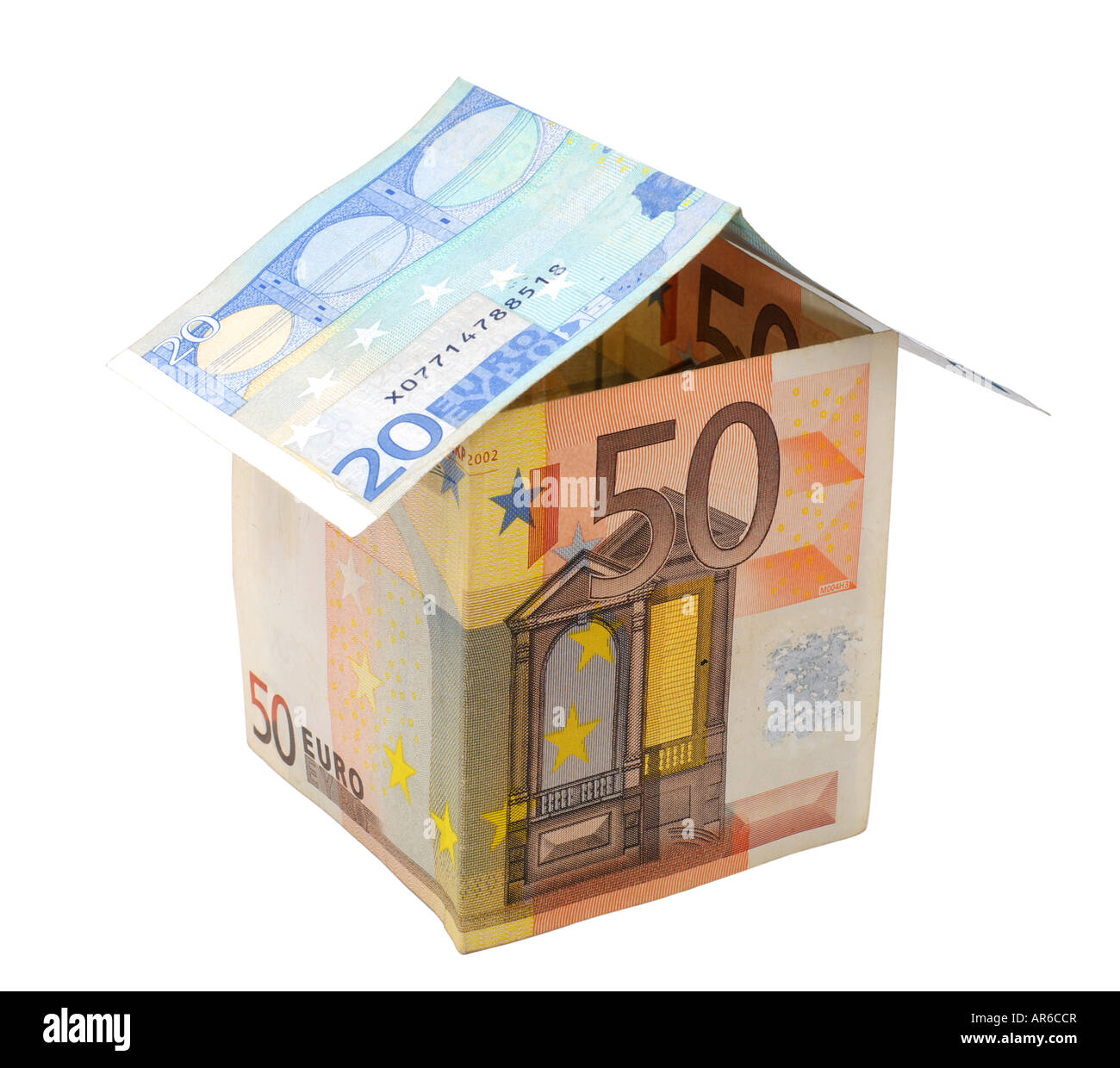 Casa fatta di carta Euro denaro Foto Stock