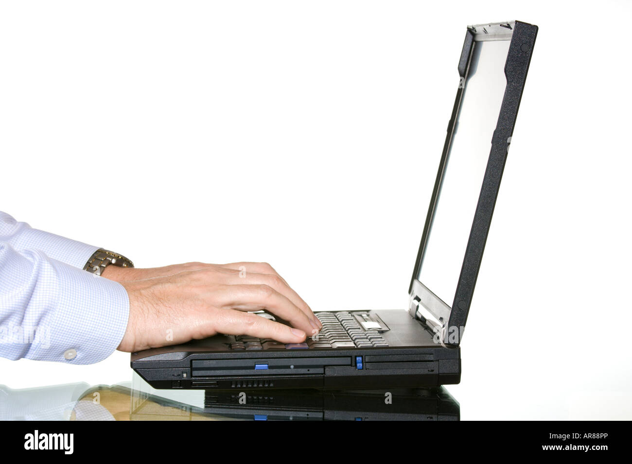 Lavorando sul computer portatile Foto Stock