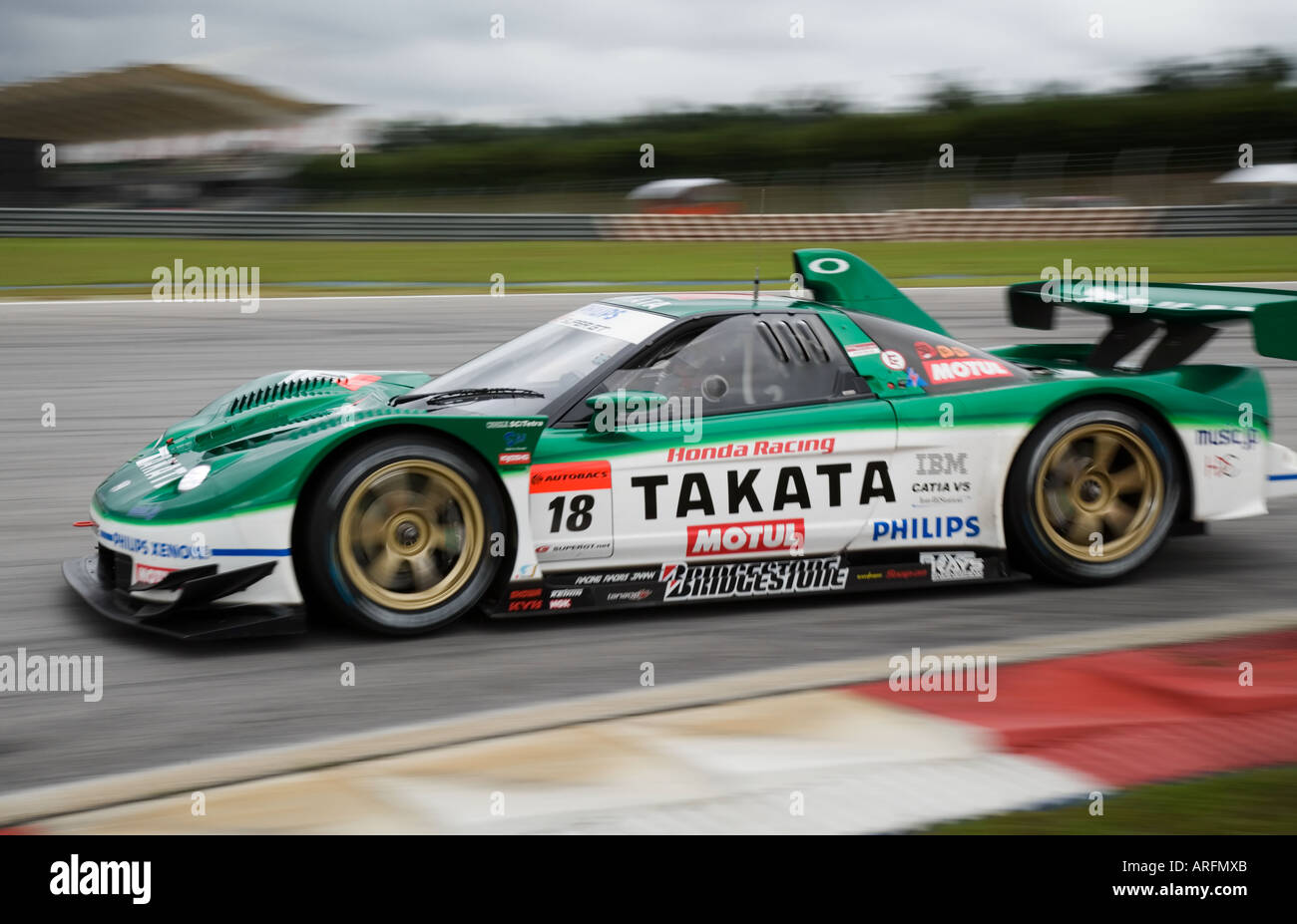 Auto JapanGT marcia in curva a Sepang International Circuit, Malaysia Foto Stock