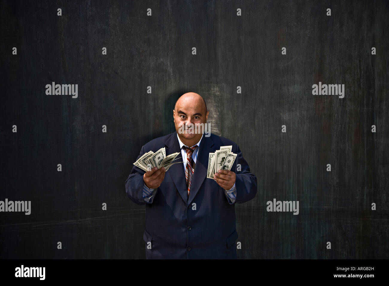 Imprenditore con contanti Foto Stock