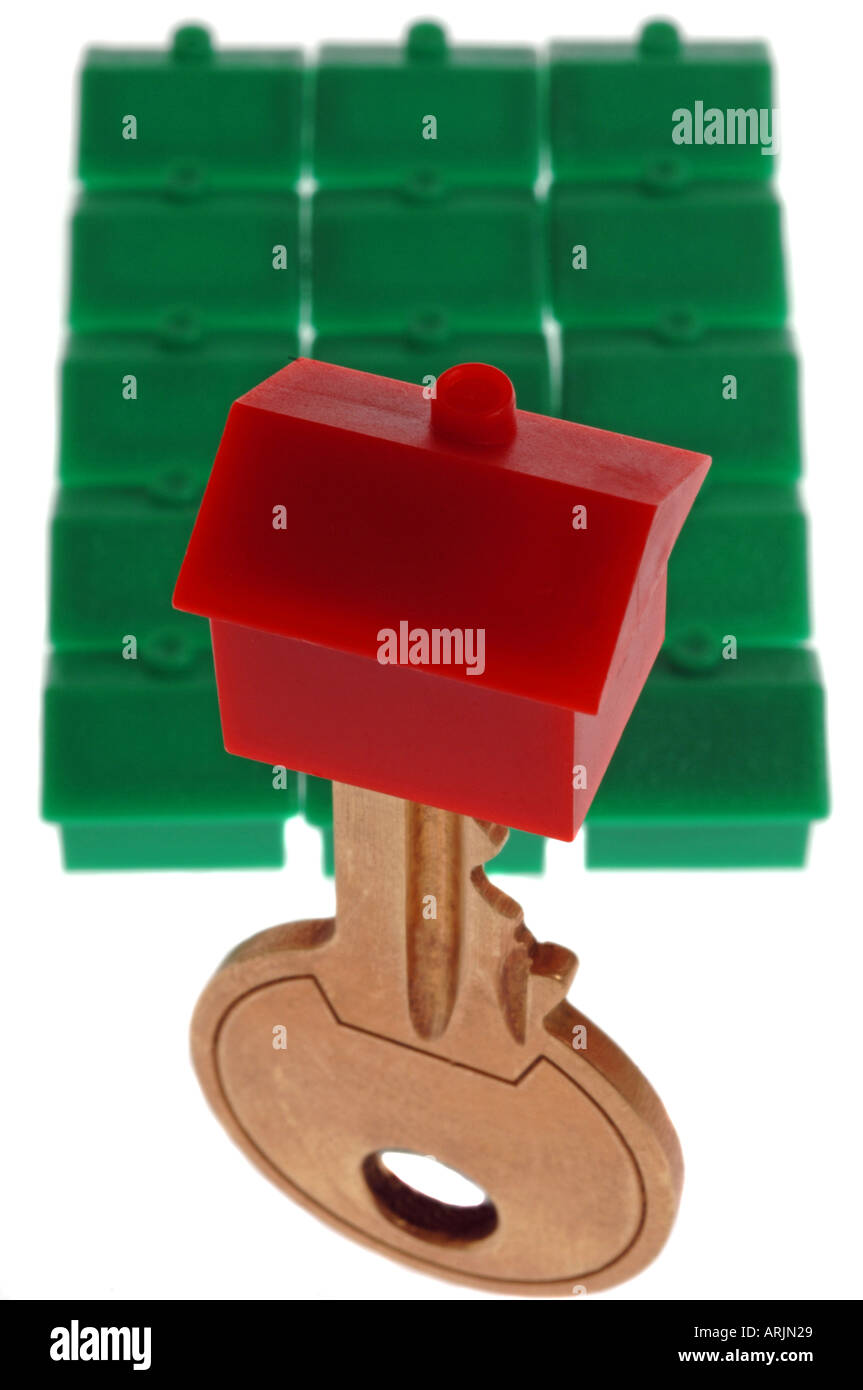Un modello di casa su un tasto Foto Stock