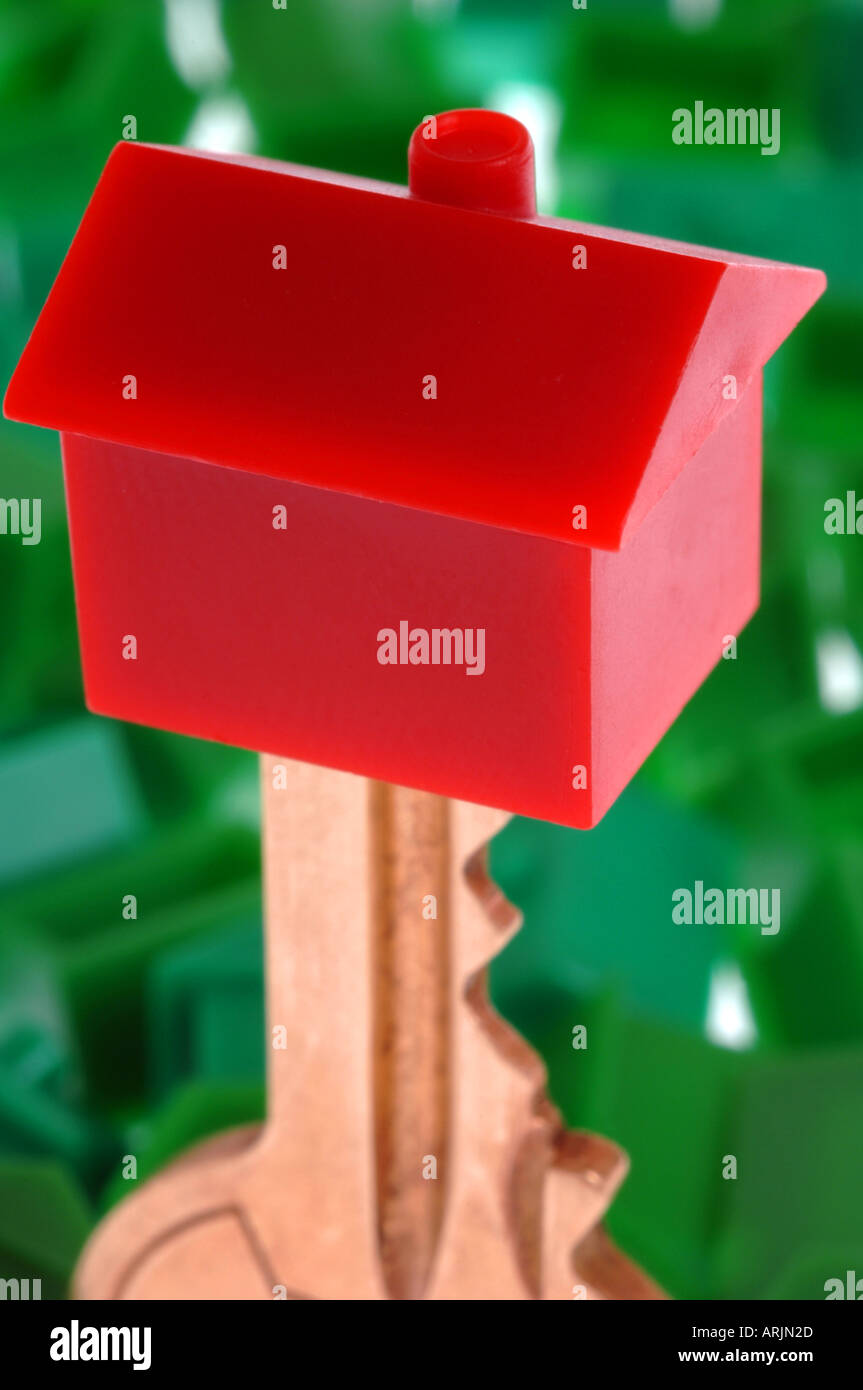 Un modello di casa su un tasto Foto Stock