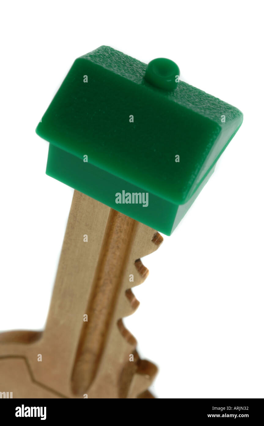 Un modello di casa su un tasto Foto Stock