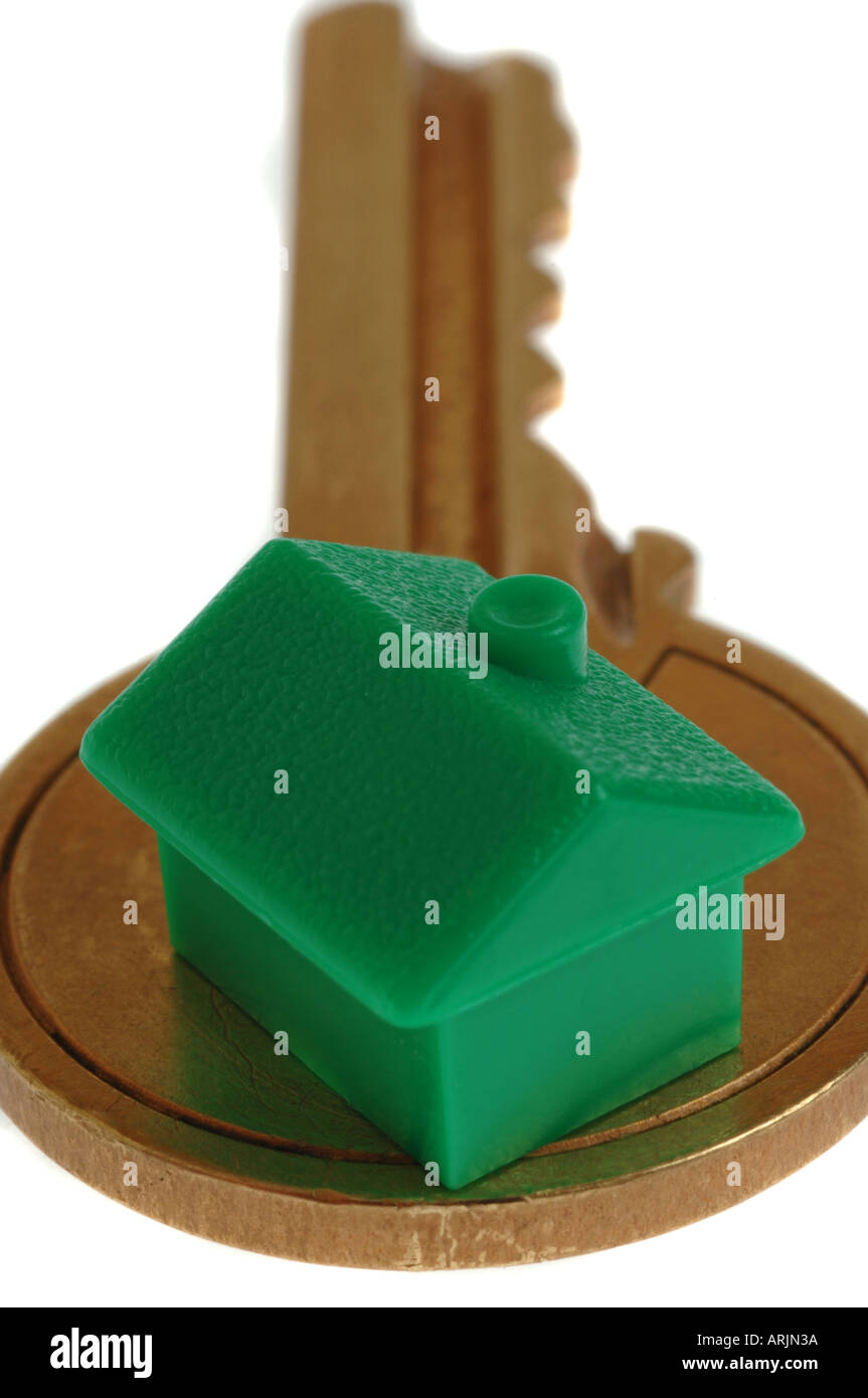 Un modello di casa su un tasto Foto Stock