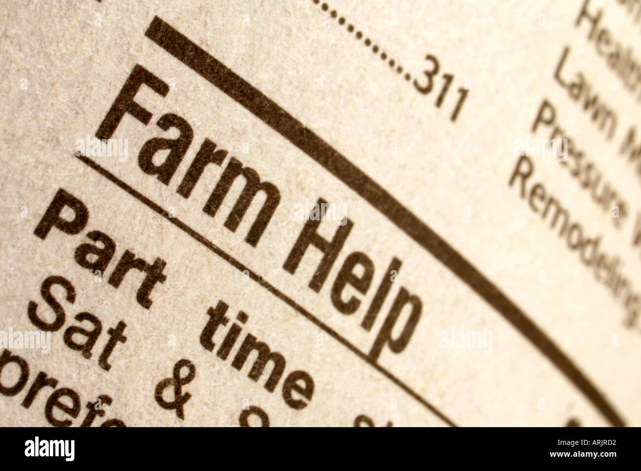 Farm aiutare annuncio nel giornale quotidiano Foto Stock