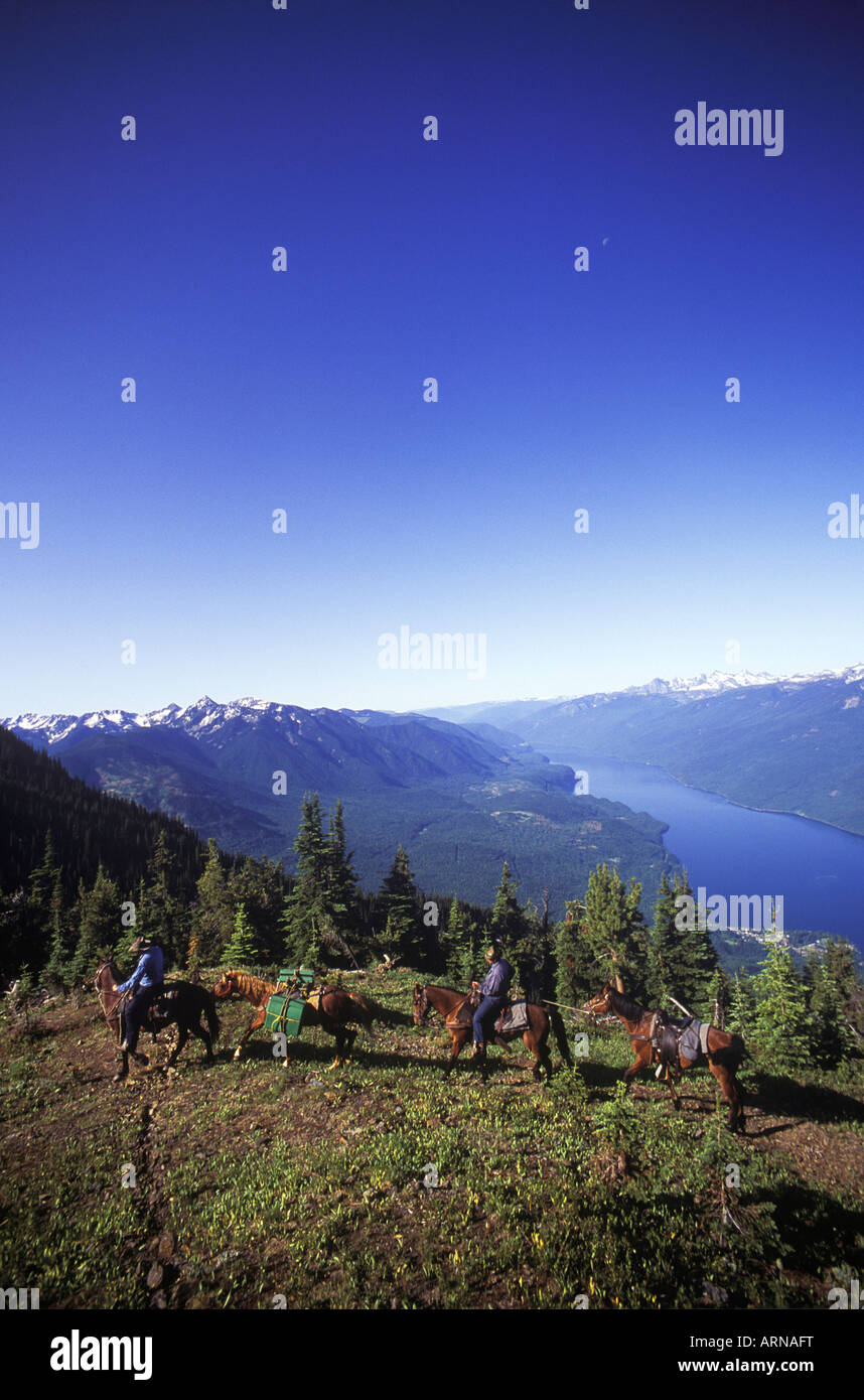 Ippovia riders, Slocan Lago, Kootenays vicino Nuovo Denver, Idaho picco, British Columbia, Canada. Foto Stock