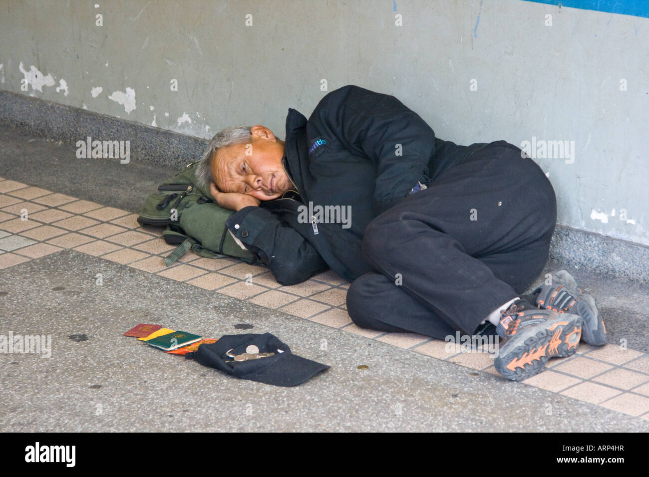 Senzatetto mendicante di Hong Kong Foto Stock