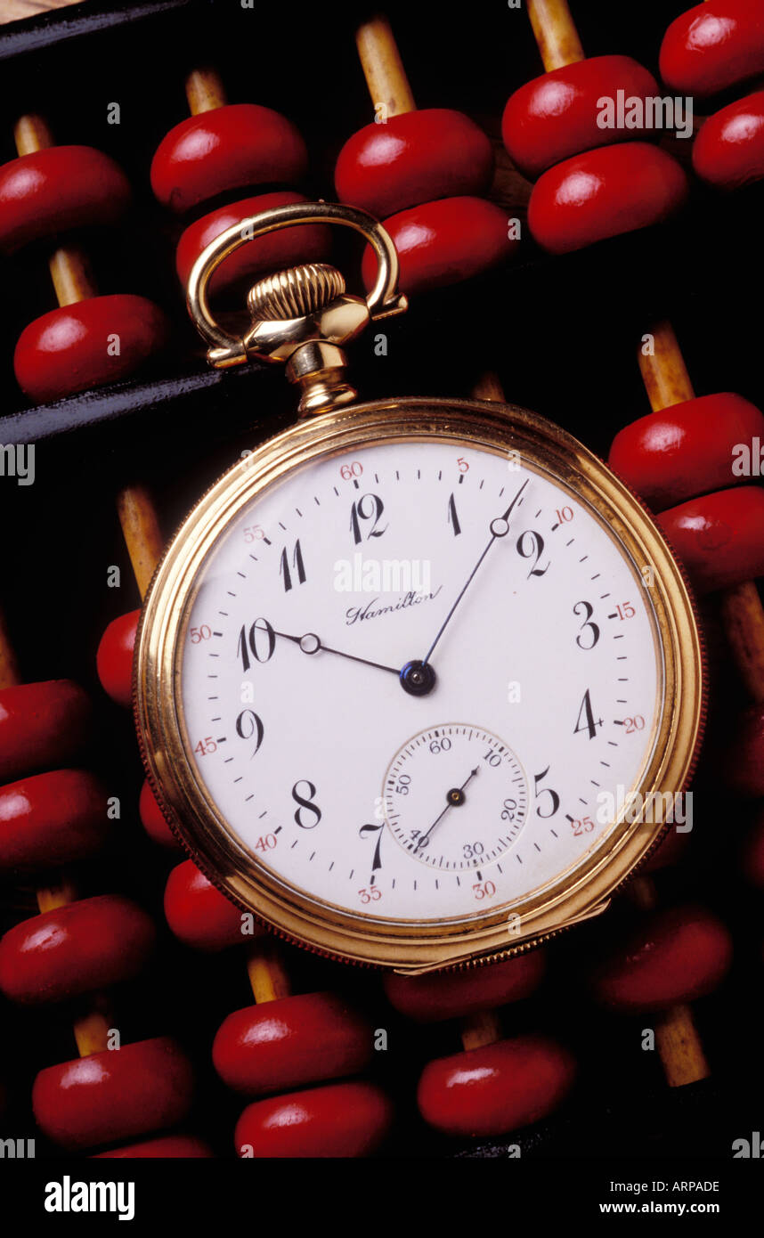 Orologio da tasca su abacus Foto Stock