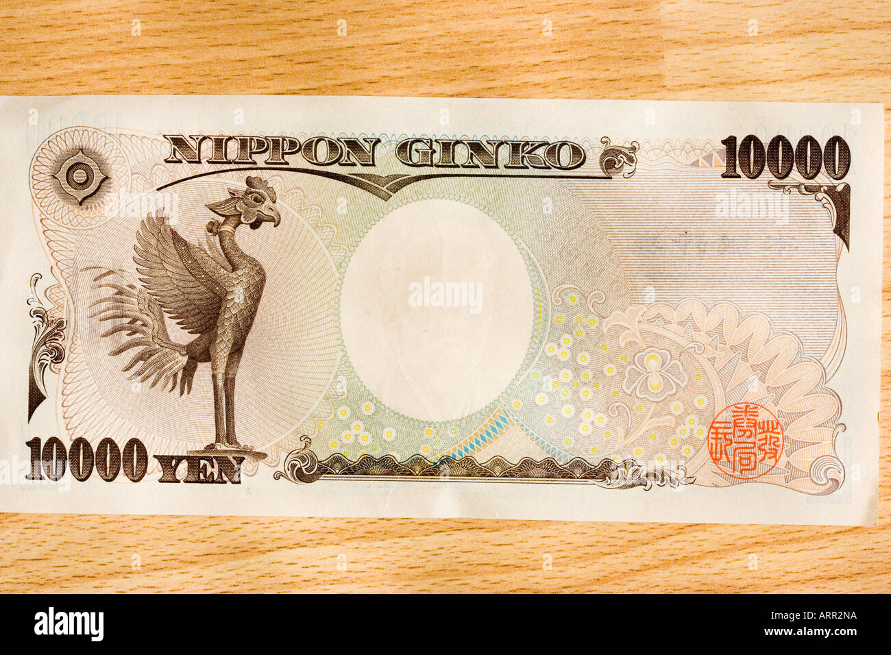 Banconota giapponese da 10,000 yen, la più grande denominazione di yen giapponese. Il lato riserva, mostra un disegno del hoo, in Hall of the Phoenix, Byodo-in. Foto Stock