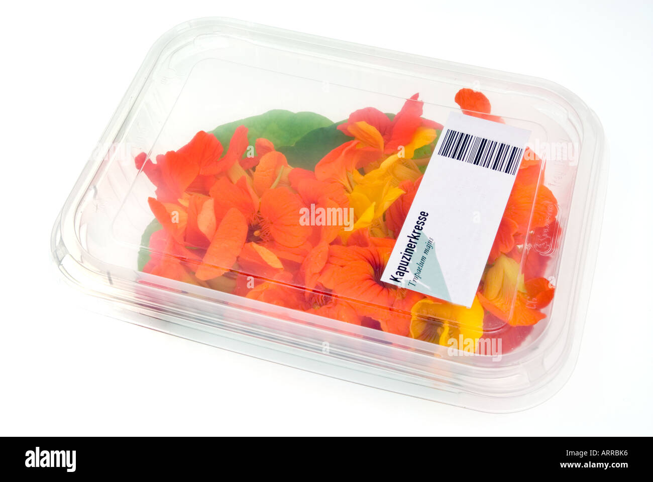 Fiori commestibili crescione Tropaeolum majus naso-twister avvolte in pellicola plastica avvolgere folie vendere vendere box pack Foto Stock