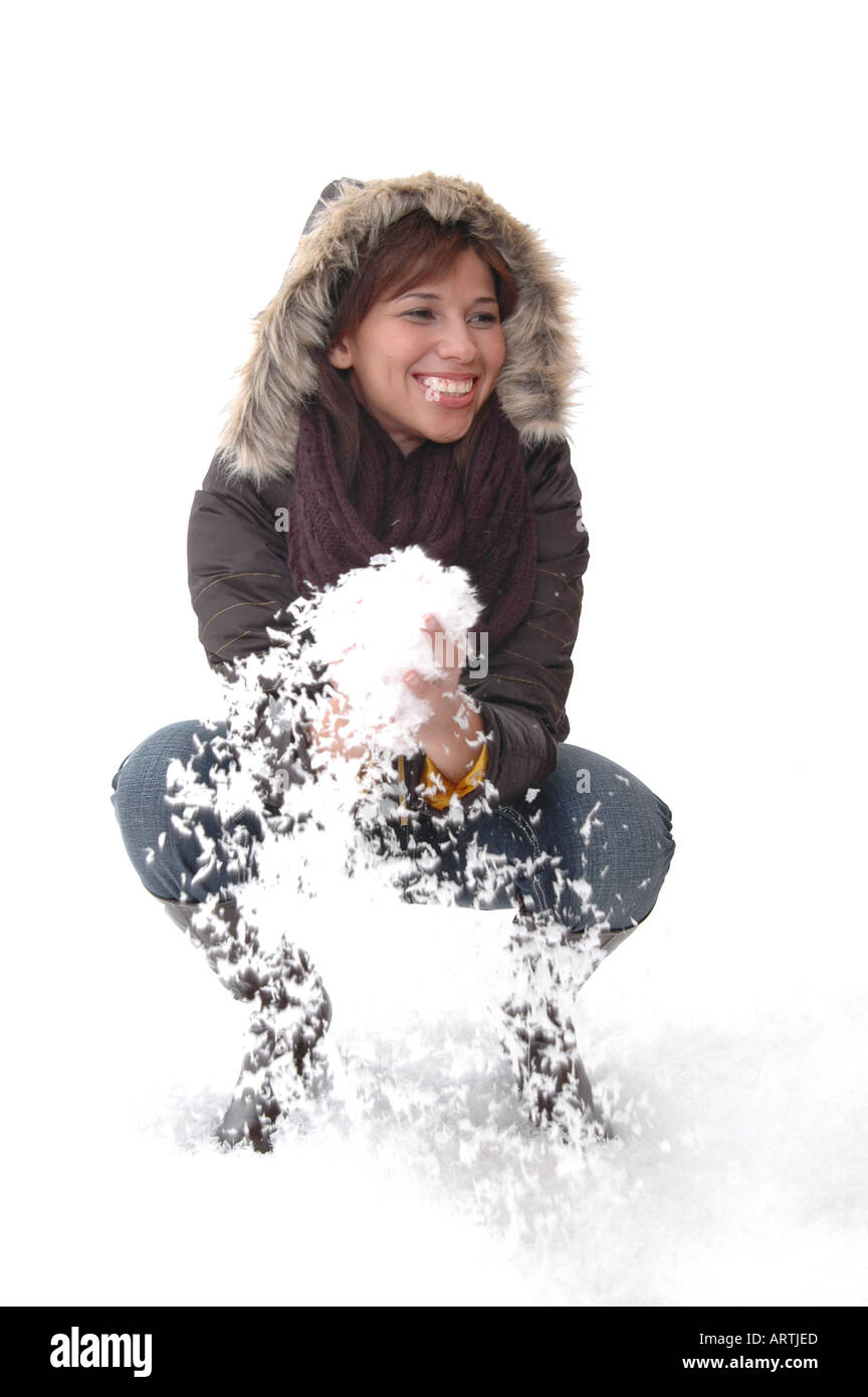 Ragazza che gioca con la neve Foto Stock