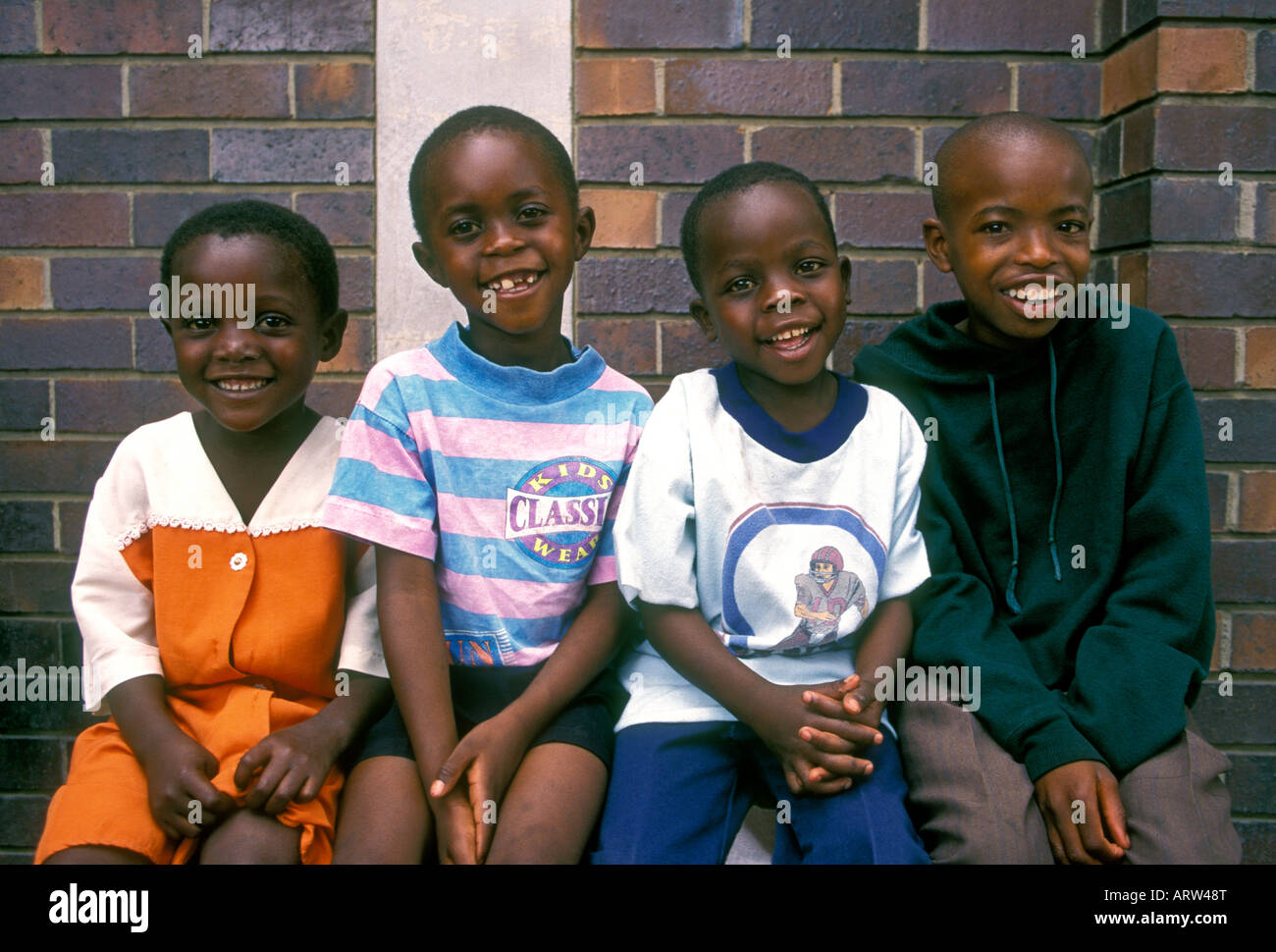 4, quattro cittadini dello Zimbabwe, i bambini dello Zimbabwe, boy, ragazzi, scolari, ragazza, ragazze, scolare e scolari,Harare, provincia di Harare, Zimbabwe Foto Stock
