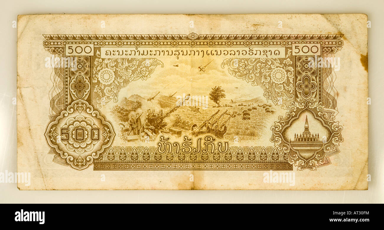 Una vecchia versione comunista del Laos valuta la Kip scena raffigura Pathet Lao lotta americana e il Lao le forze governative Foto Stock