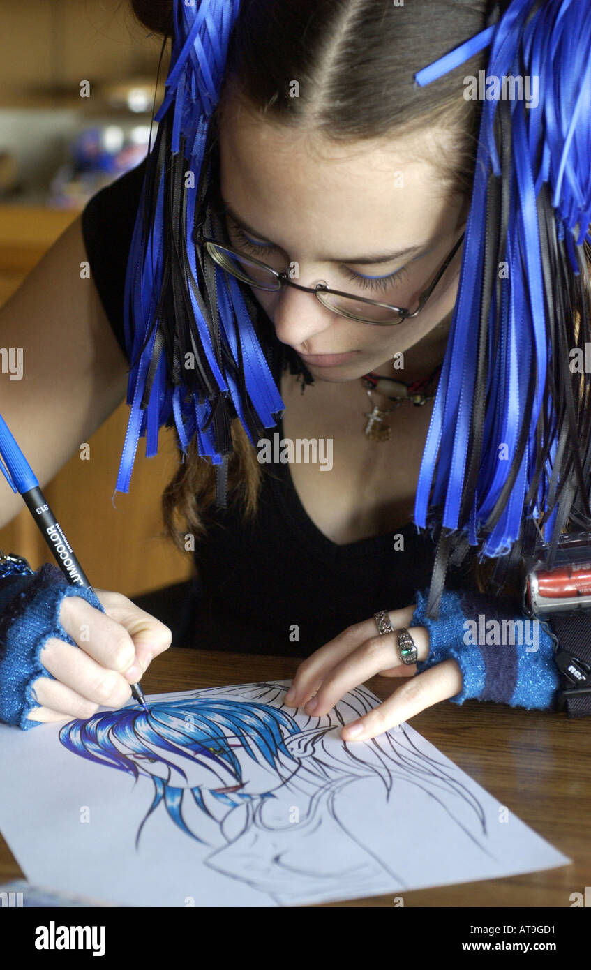 Artista adolescente capelli disegno fatto in panini e nastri blu Foto Stock
