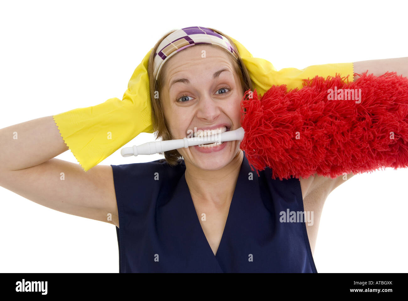 Charwoman nel panico, con piumino nella sua bocca Foto Stock