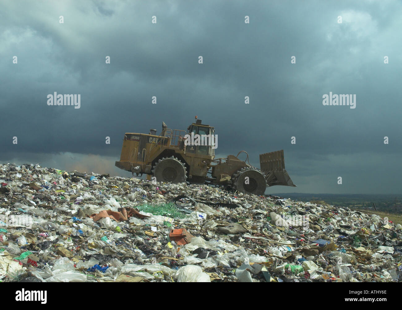 Discarica di rifiuti Compator danno ambientale inquinamento cambiamento climatico Foto Stock