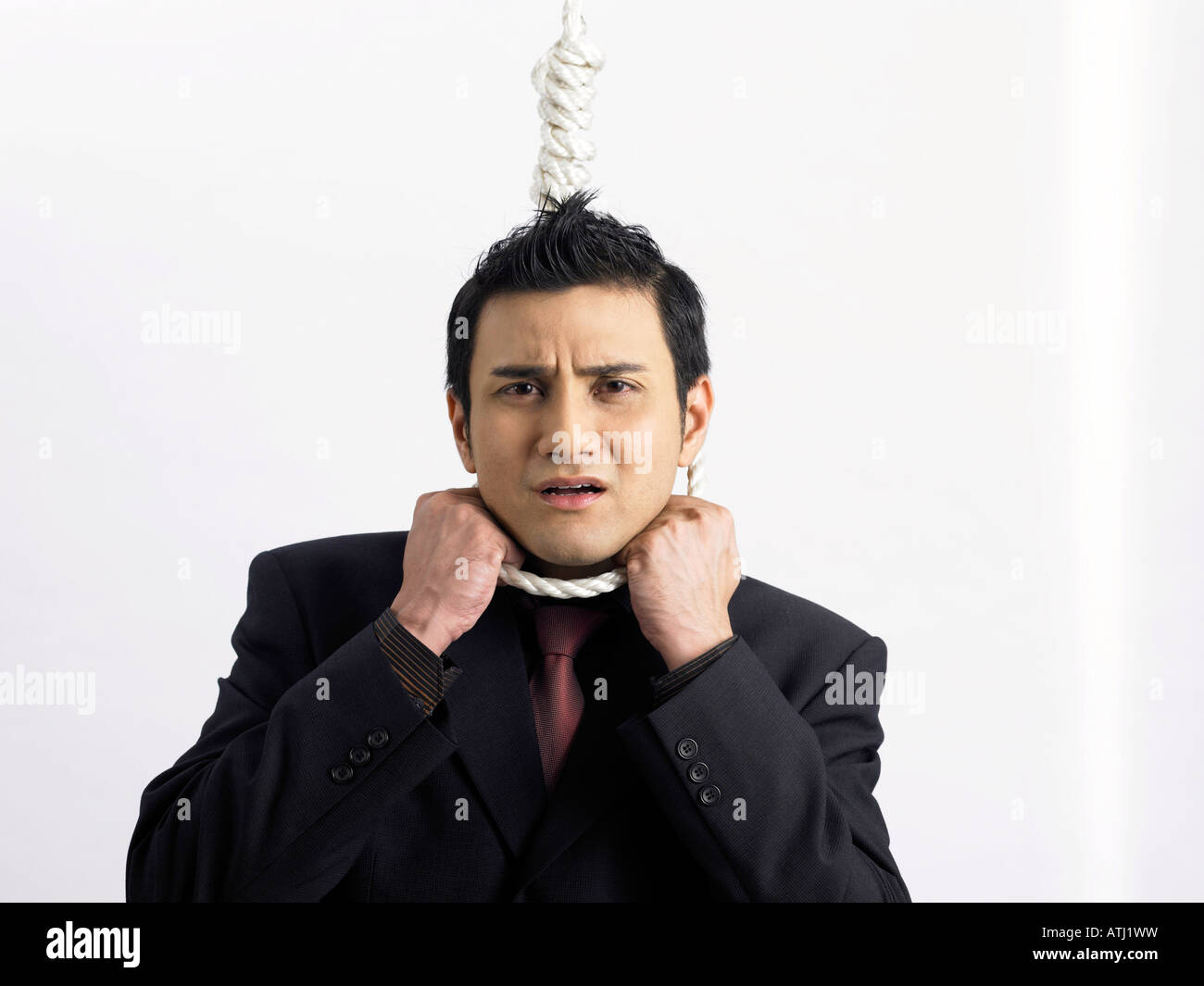 Imprenditore con corda intorno al suo collo Foto Stock