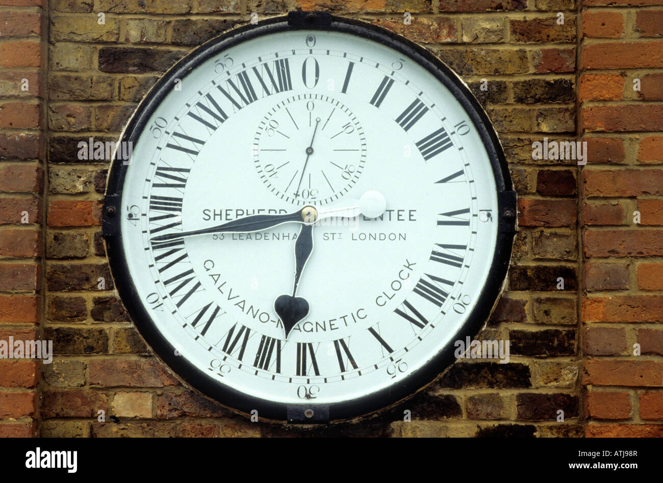 Greenwich 24 ore ventiquattro ore di quadrante di orologio Londra  Inghilterra pezzo tempo cronometro Foto stock - Alamy