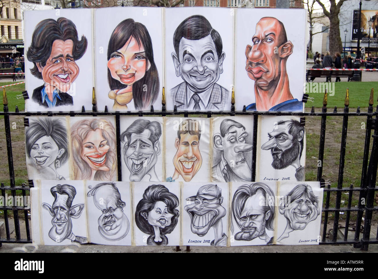 Caricature di persone famose in Leicester Square Londra Inghilterra REGNO UNITO Foto Stock