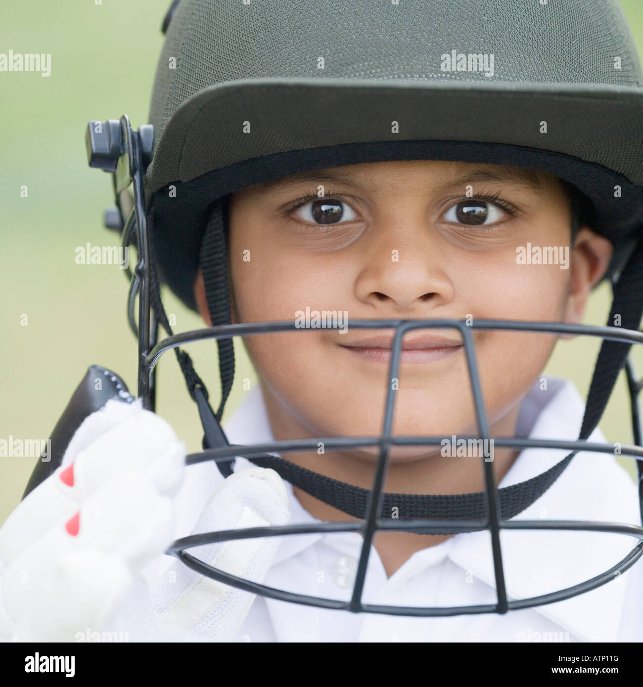 Ritratto di un giocatore di cricket sorridente Foto Stock