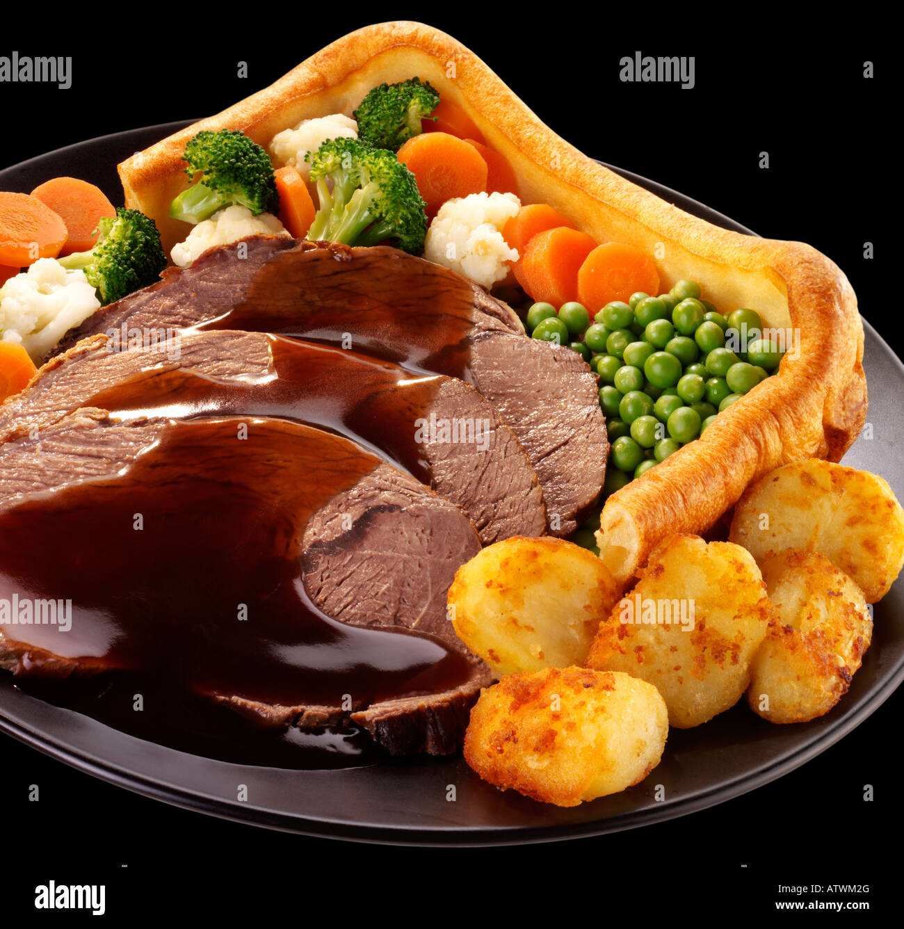 GIANT Yorkshire pudding la cena con carne di manzo Foto Stock