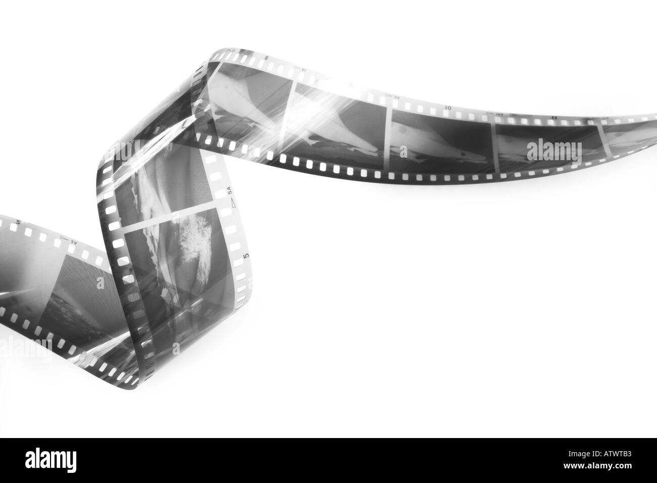 Film in bianco e nero di negativi in modo lasco arricciato Foto Stock