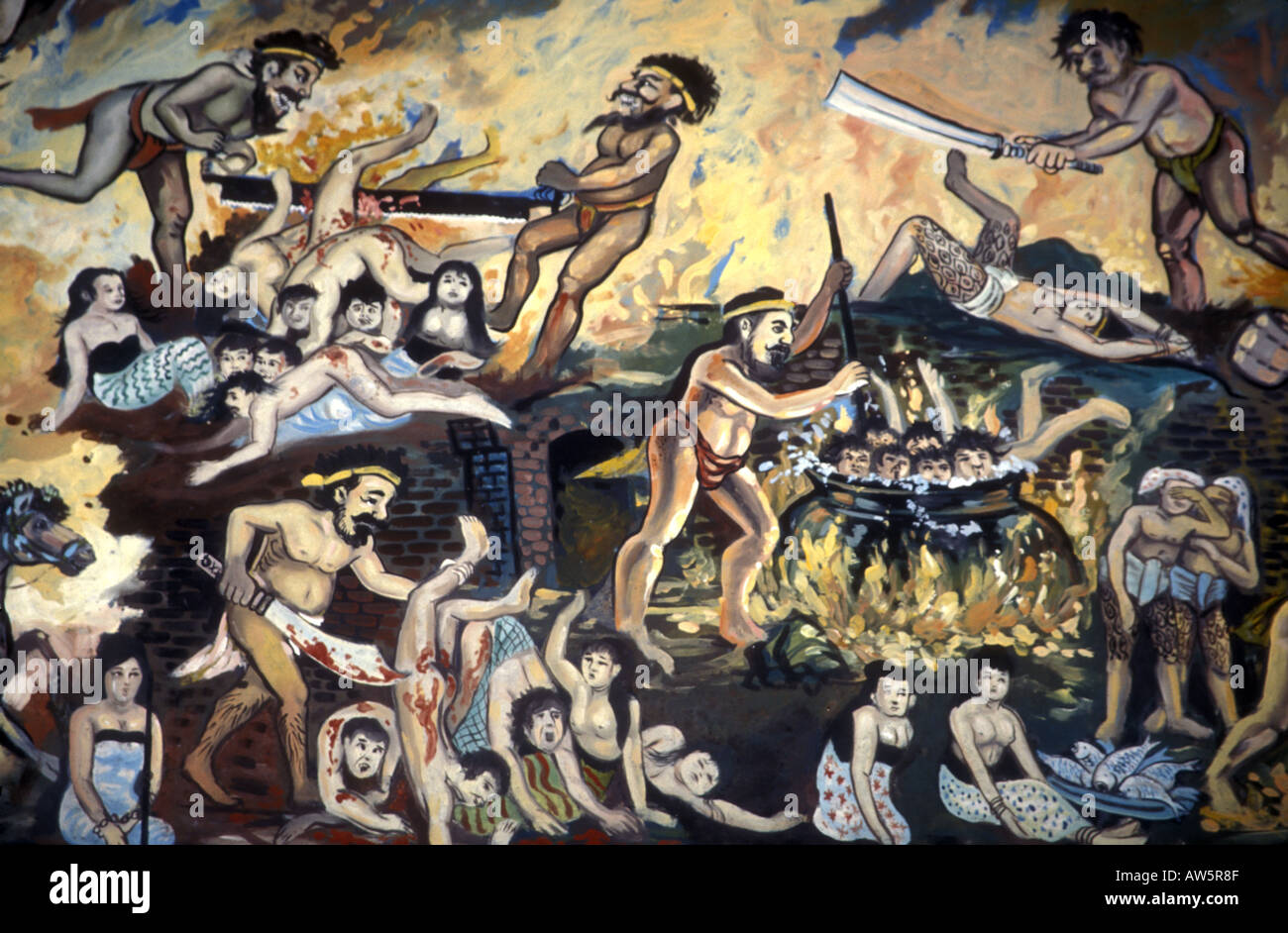 Murale buddista raffigurante inferno-fuoco, damnazione con demoni sanguinosi in lotta tra loro Foto Stock