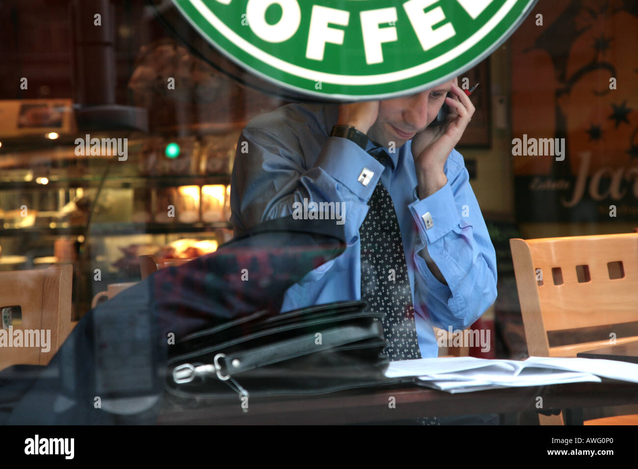Business man in coffee shop Foto Stock