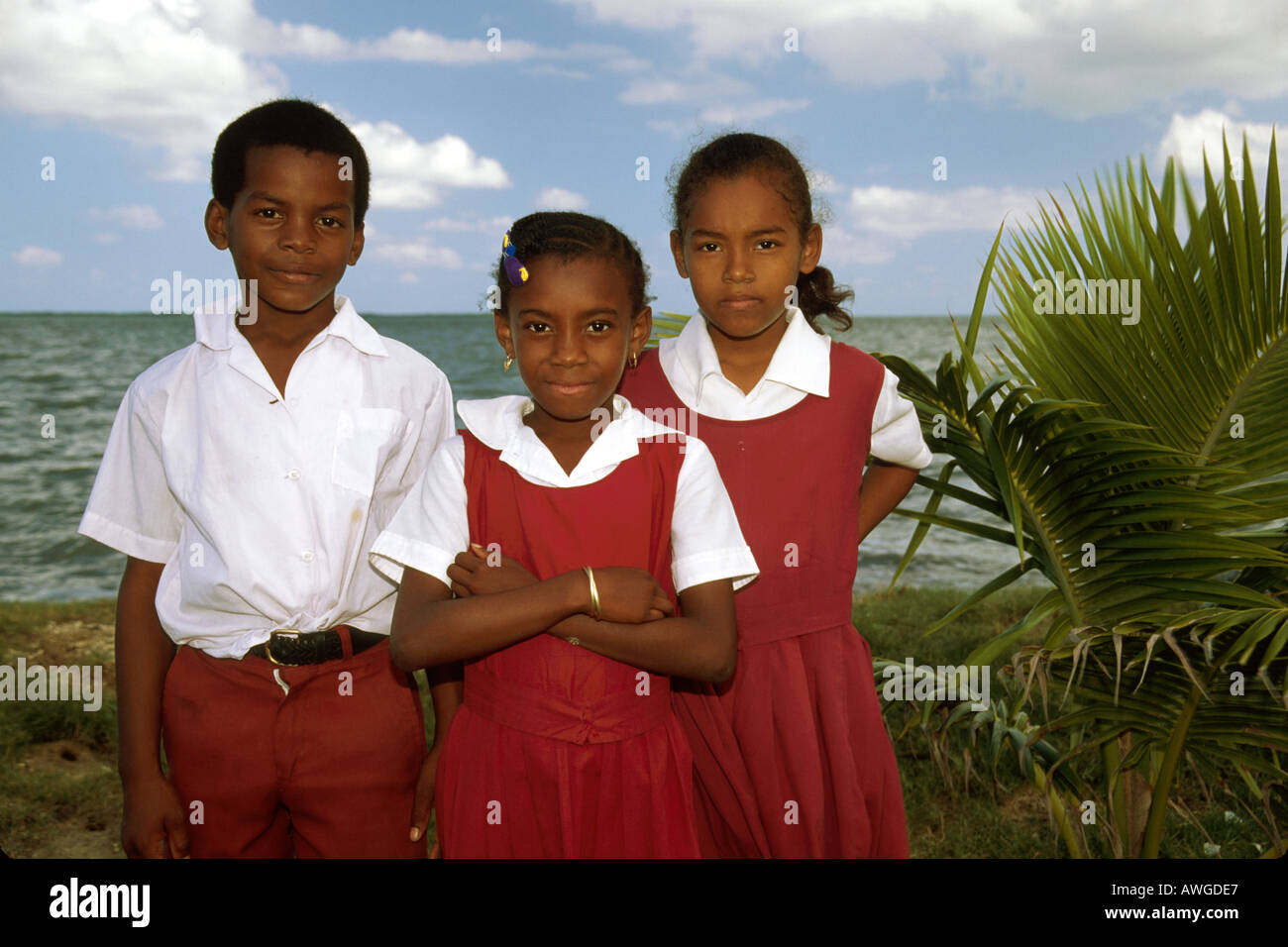 Belize, ex Honduras britannico, Mar dei Caraibi, acqua, America Centrale, Pan American, Tropics, Belize City, studenti della Central Christian School, uniformi Foto Stock