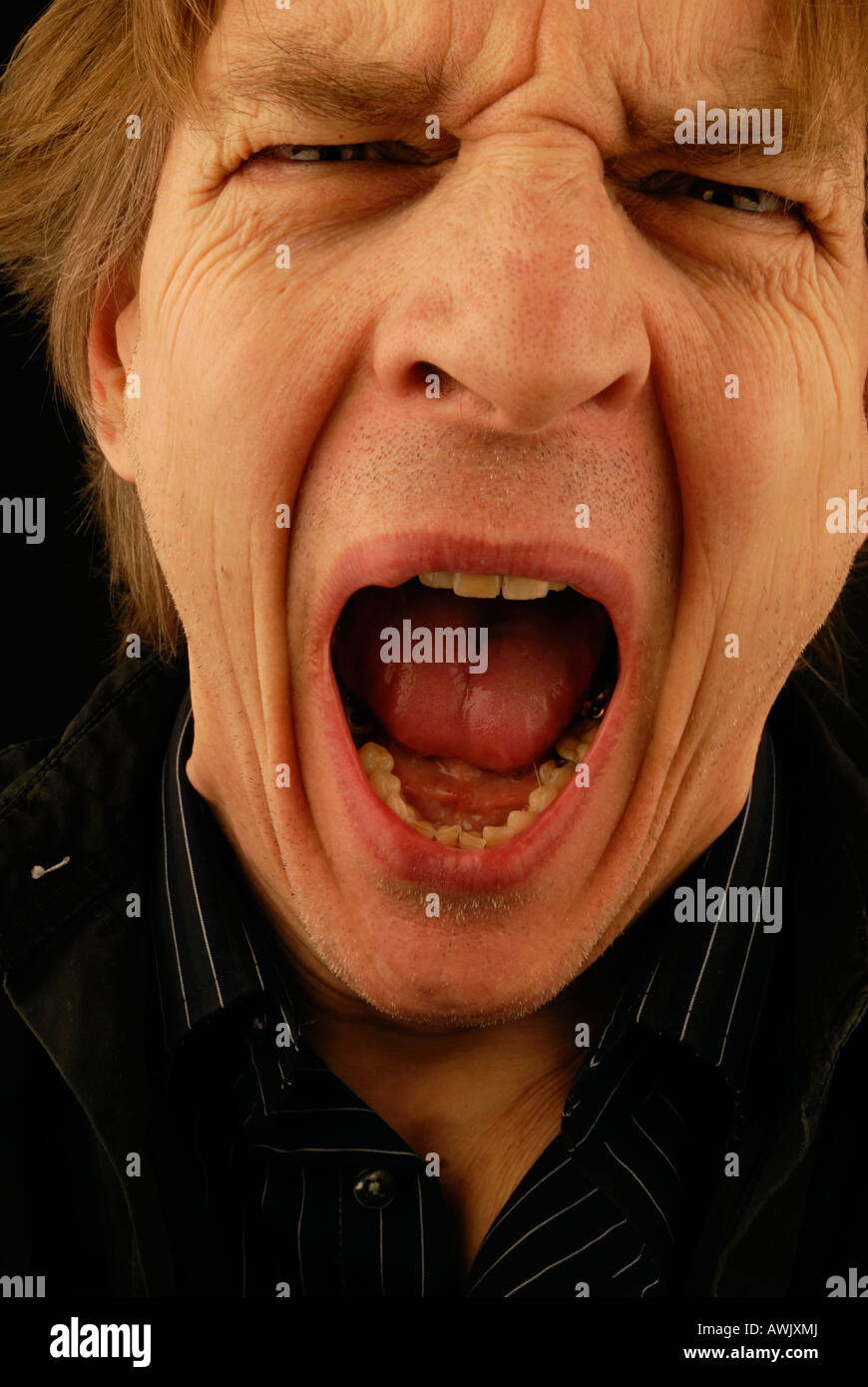 Urlo. No. 2 - Uomo urlando, odio, rabbia, adulto, forte. Foto Stock