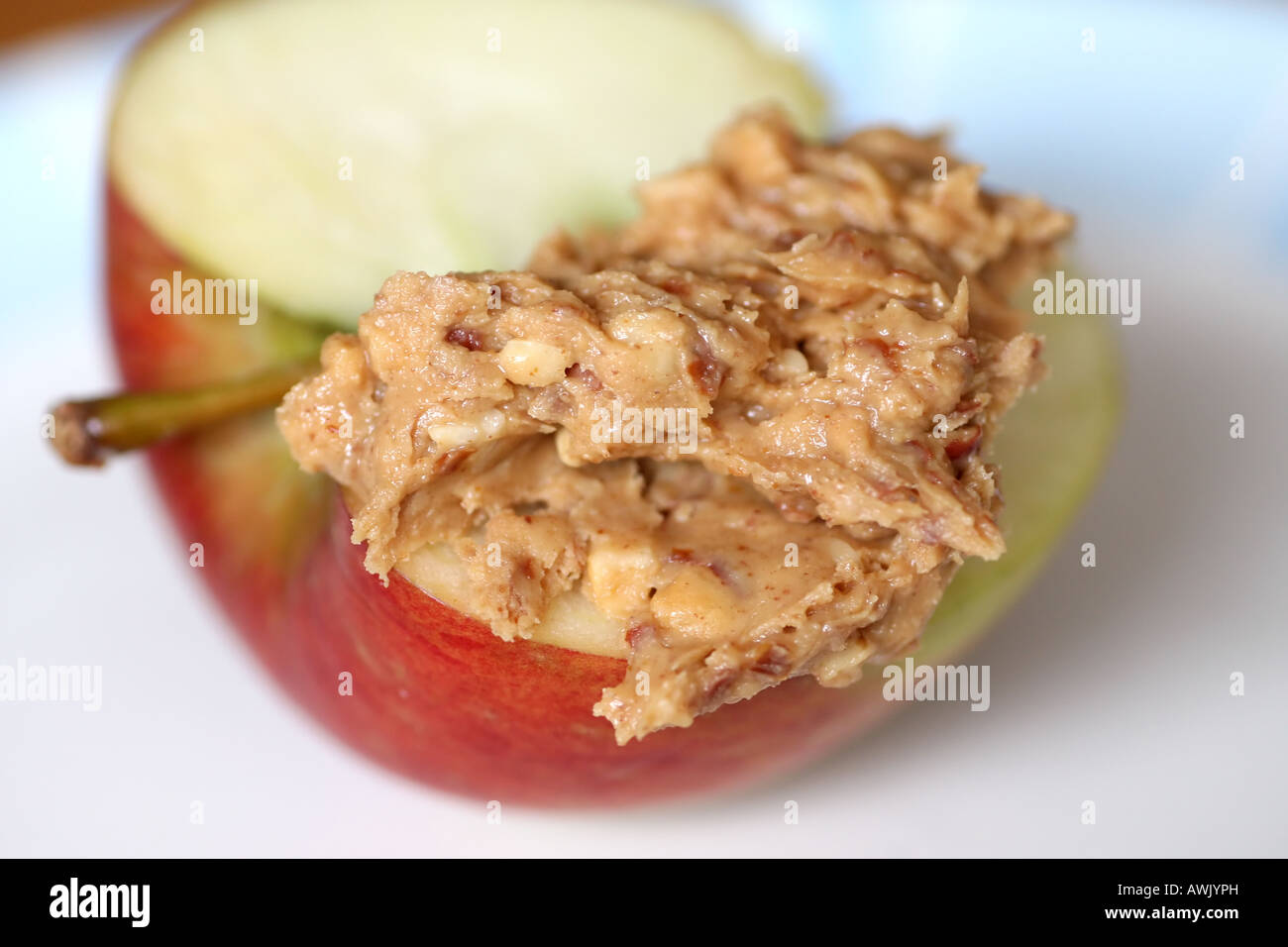 Apple e burro di arachidi Foto Stock