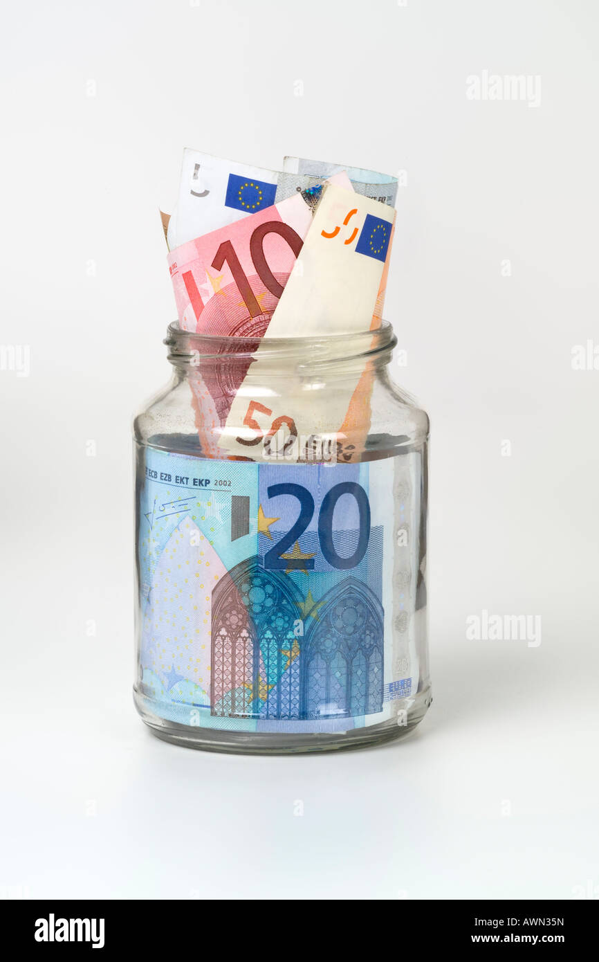 Banconote in euro in un barattolo di vetro Foto Stock