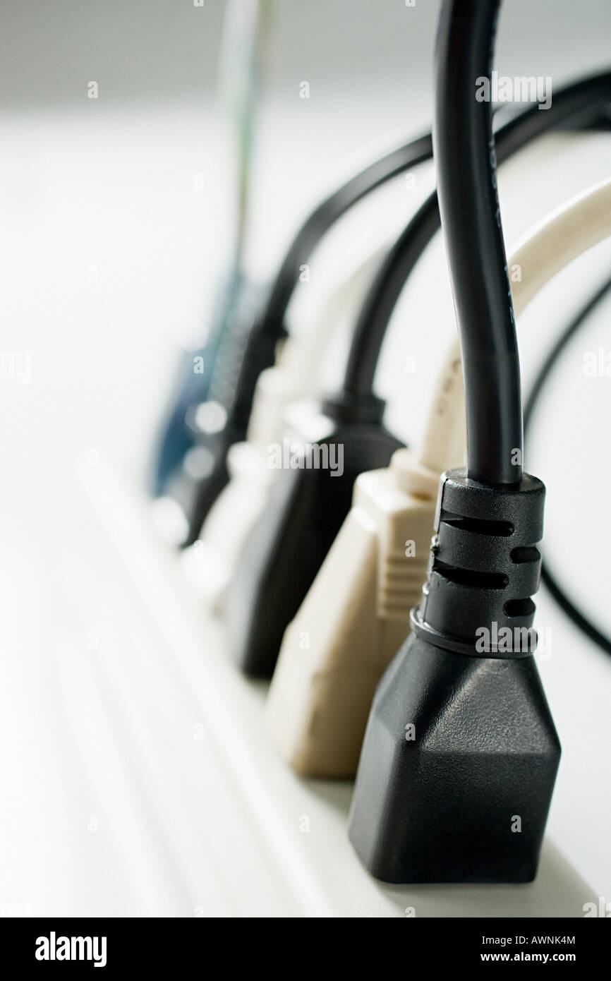 Le spine elettriche e prese elettriche Foto Stock