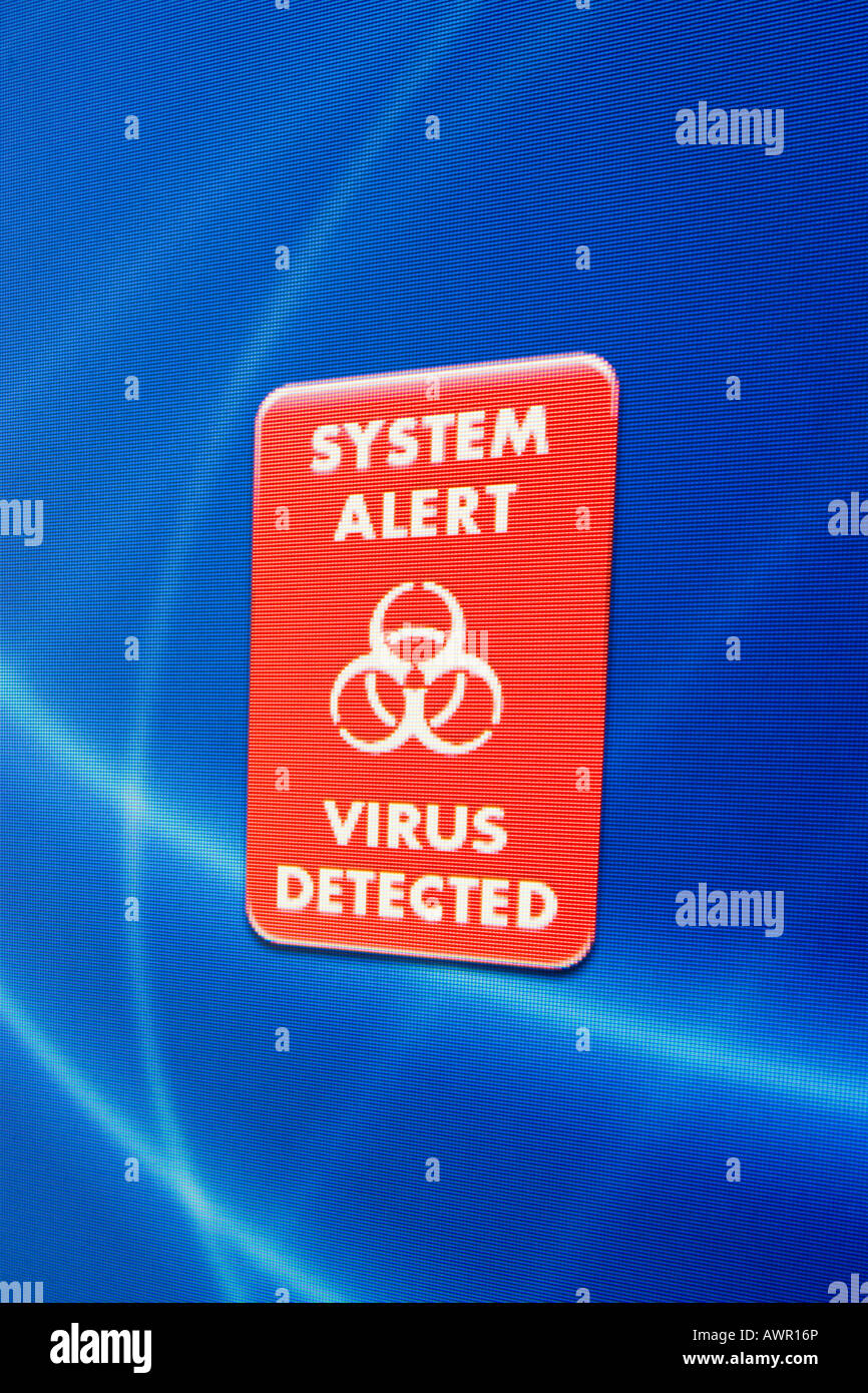 Il monitor di un computer shot, 'system alert virus rilevato' messaggio Foto Stock