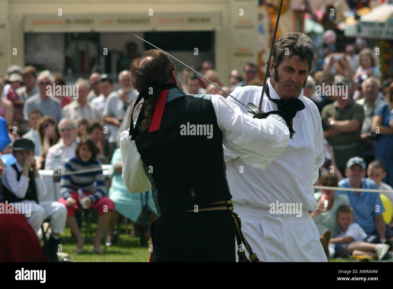 Vestiti in stile vittoriano duellist combattimenti ravvicinati dickens festival Foto Stock