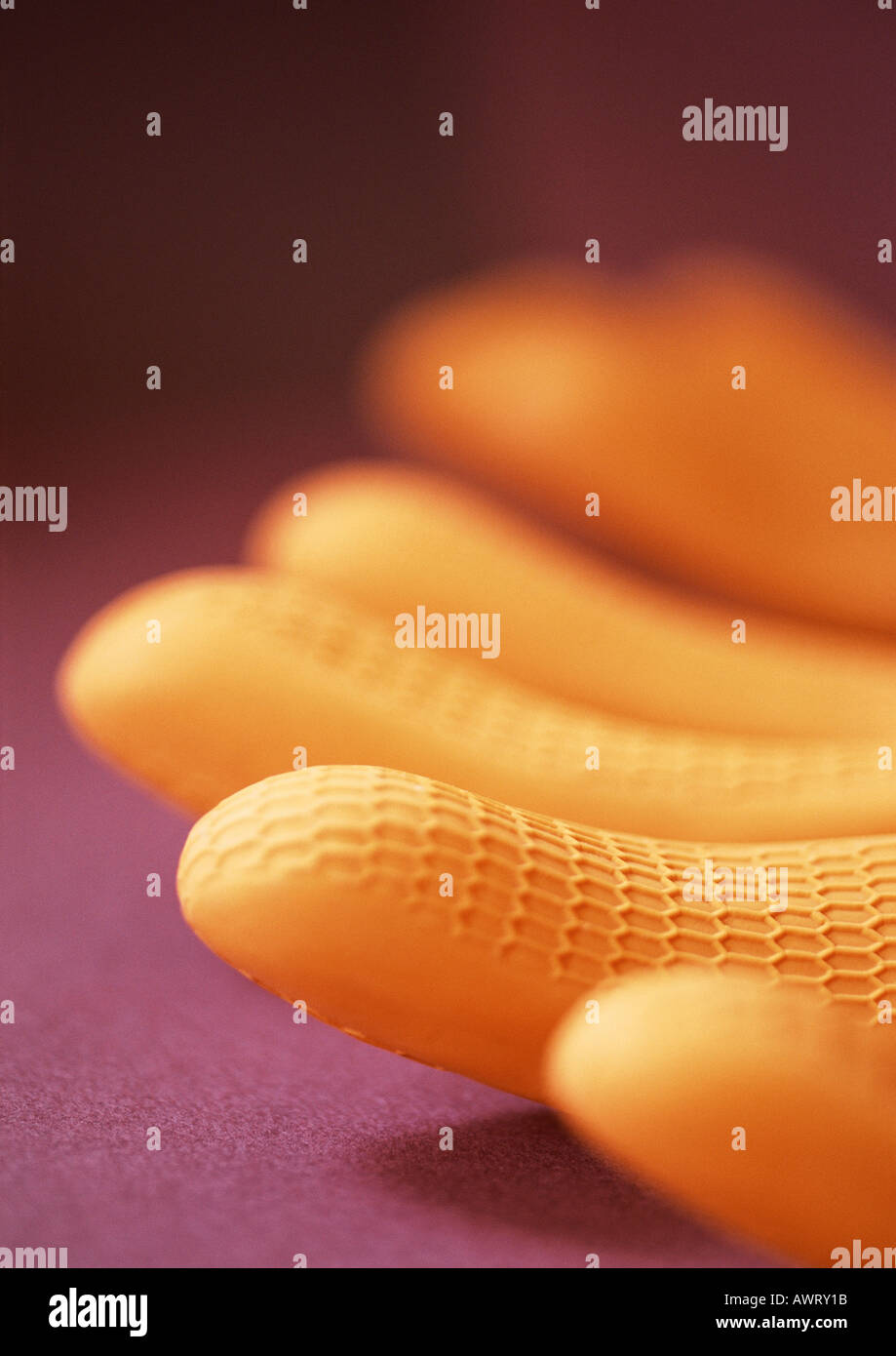 Guanti di gomma, extreme close-up Foto Stock
