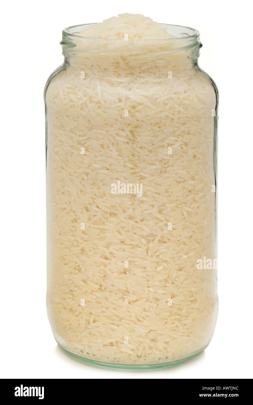 Bianco Basmati riso a grani lunghi seme greggi il vasetto di vetro contenitore pieno sopra alternativa astratta area appetitosi aromatico aroma Foto Stock