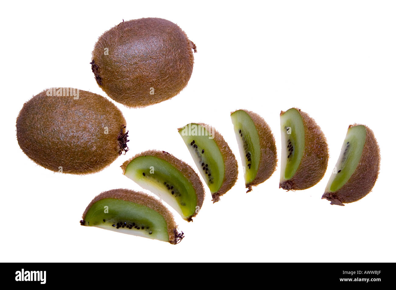 Tre i Kiwi due interi uno in cunei Foto Stock