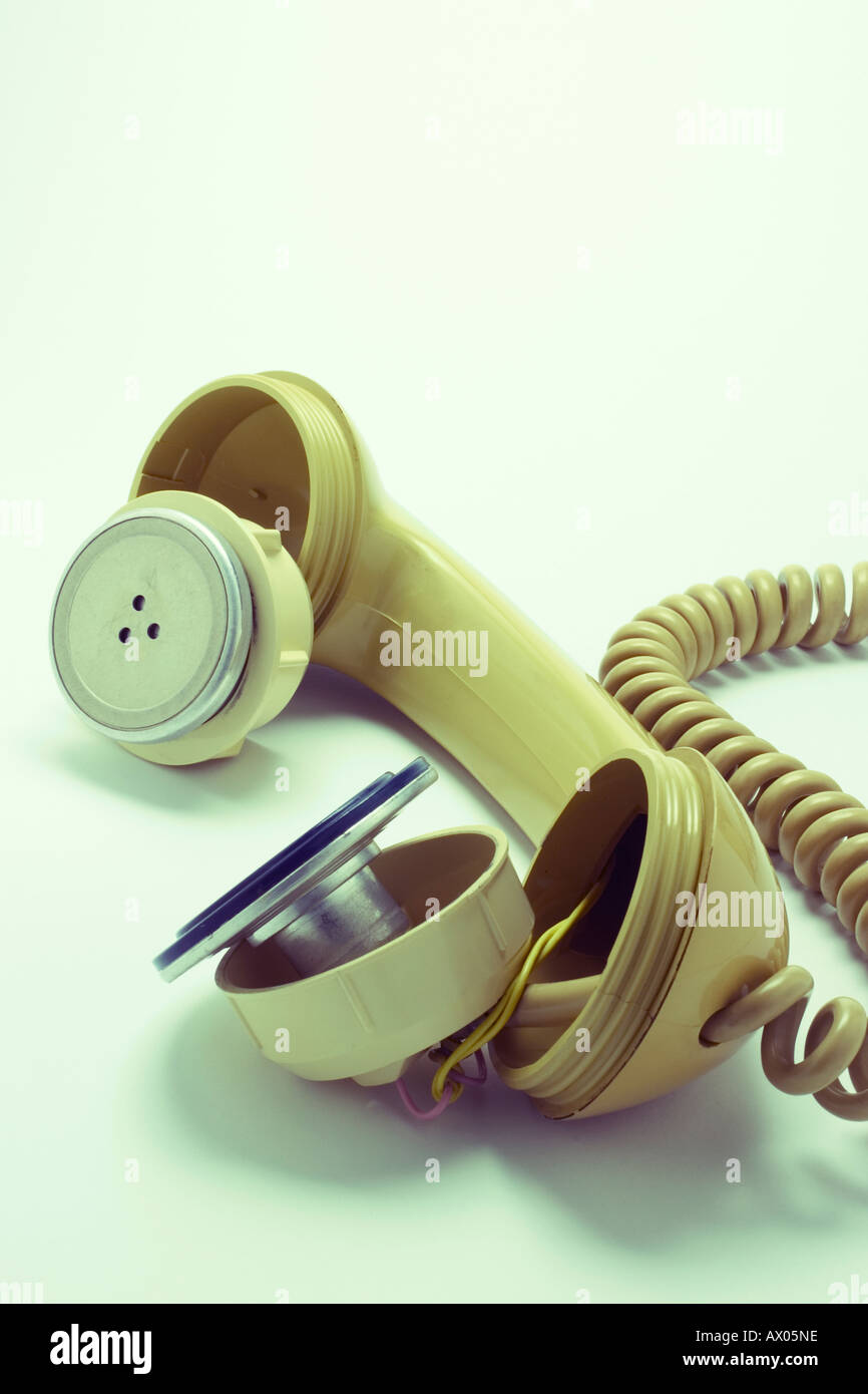 Rotture di cornetta del telefono Foto Stock