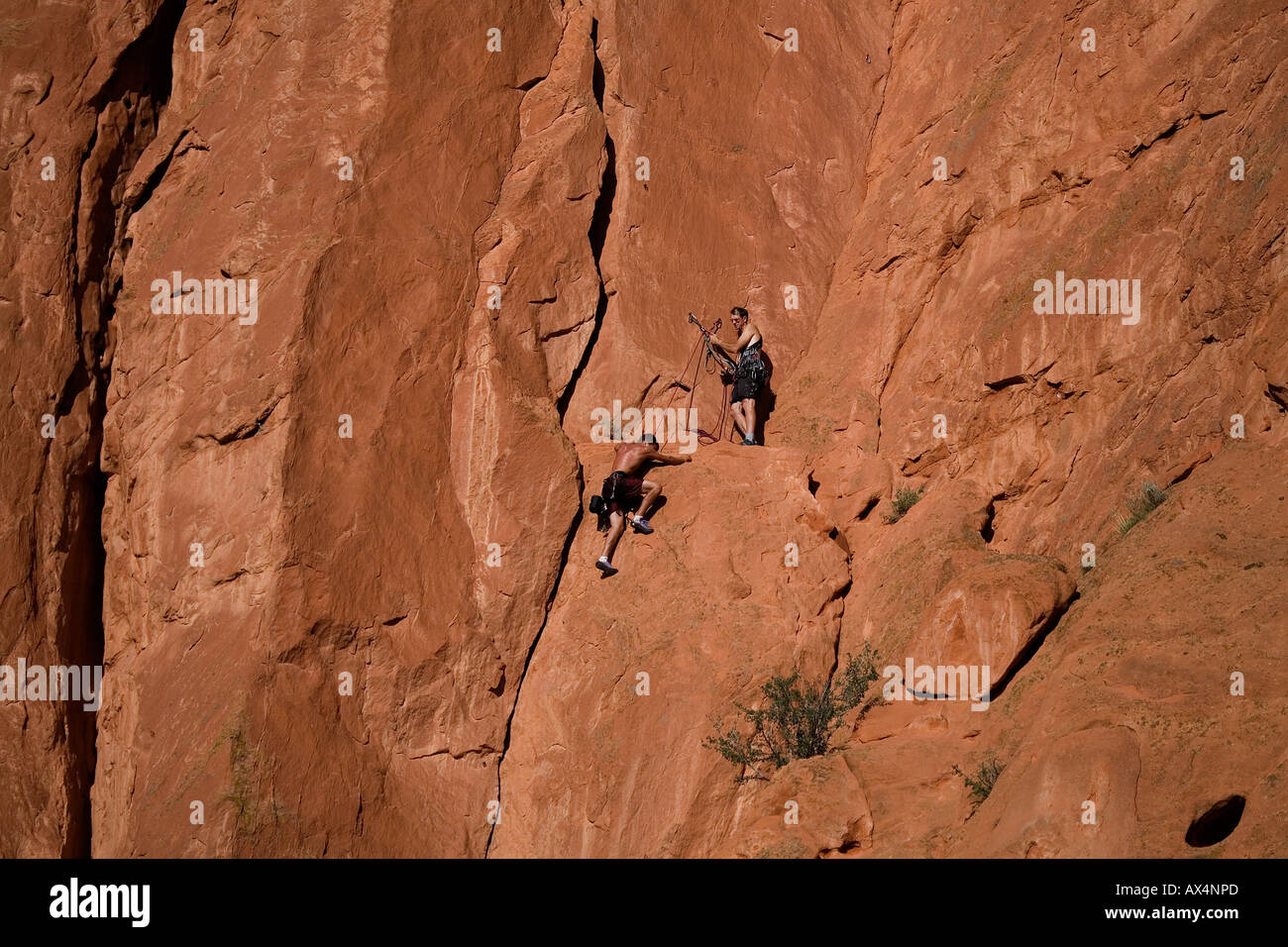 'Scaling una montagna' Foto Stock