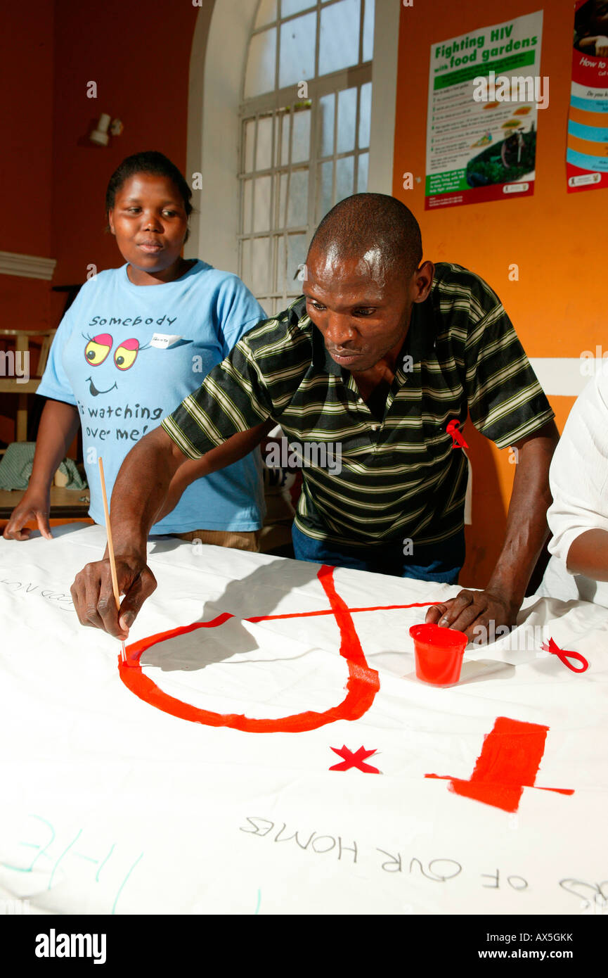 Disegno uomo il nastro rosso, HIV/Aids awareness a Capetown, Sud Africa e Africa Foto Stock