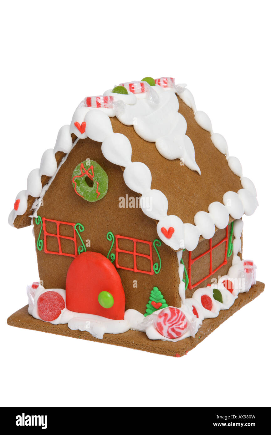 Gingerbread House ritagliata su sfondo bianco Foto Stock